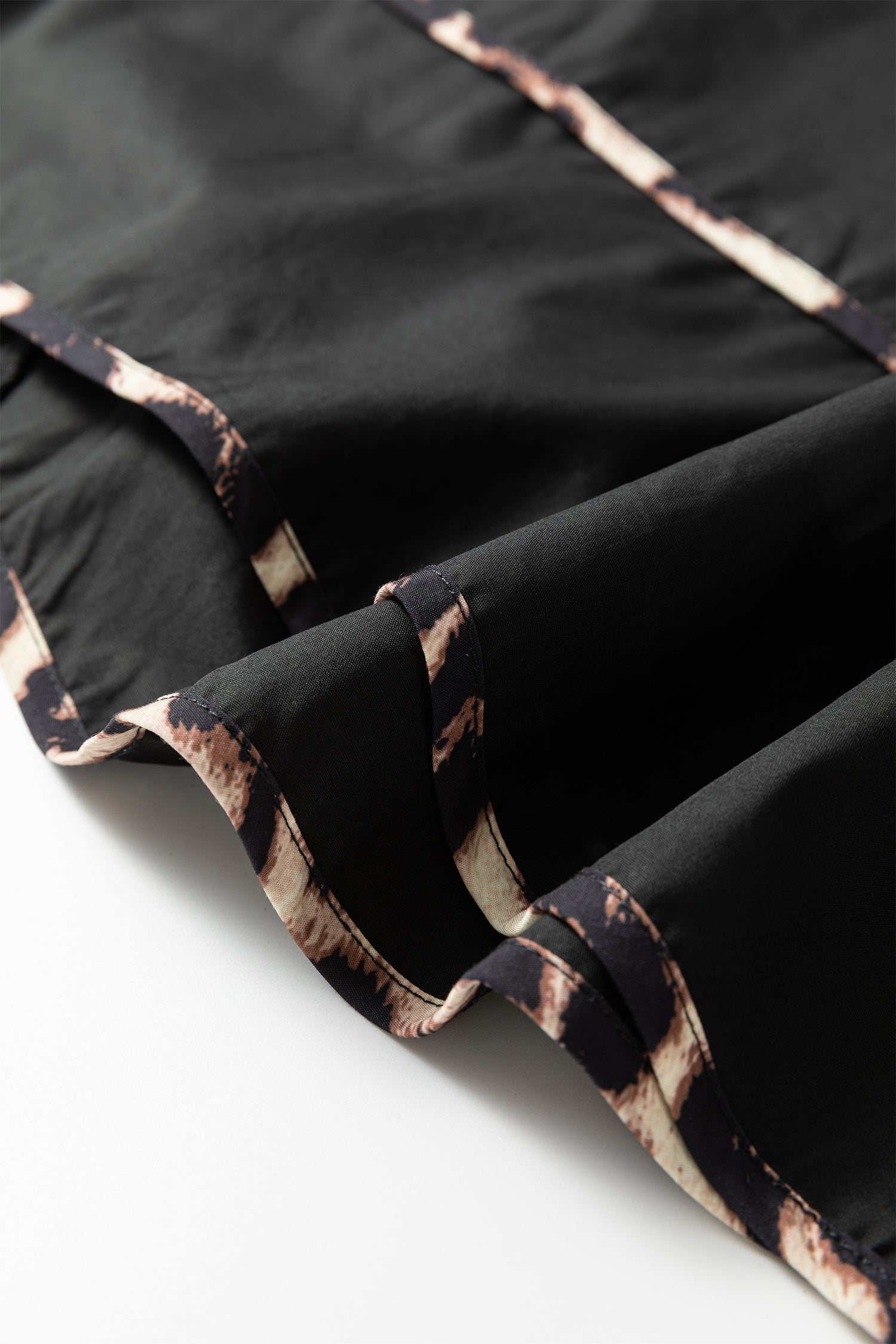 Black Plus Size Long Sleeve Leopard Contrasted Trim Tie Neck Flared Mini Dress