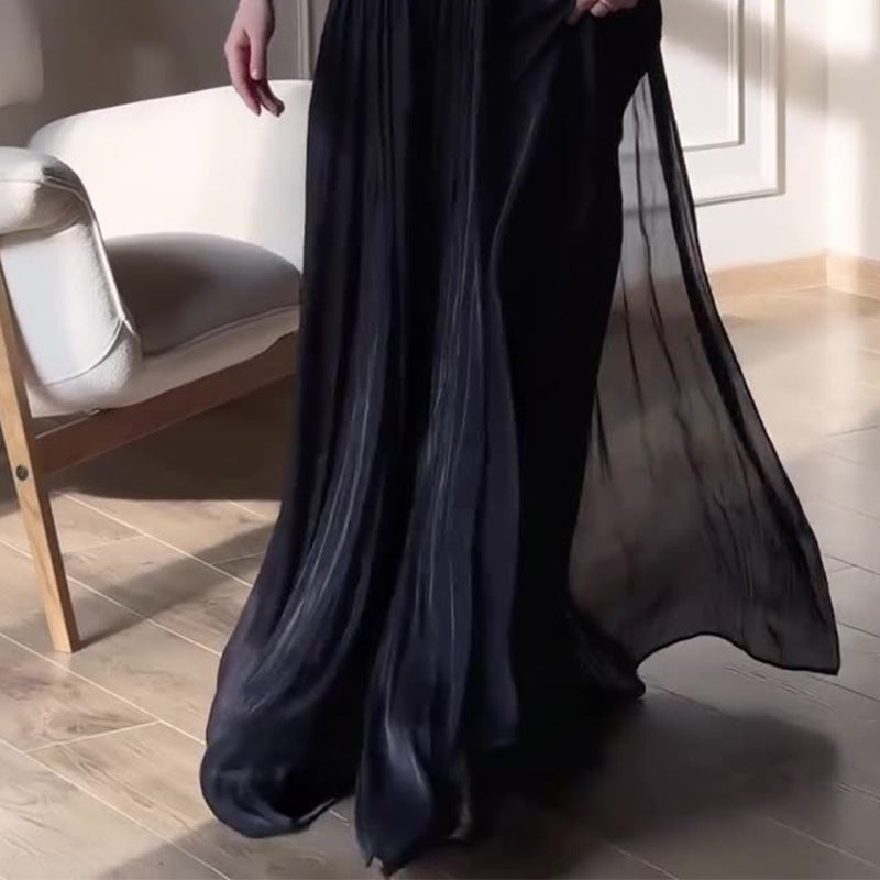 Black French Style Elegant Dress With A Square Neckline Pleated Detailing And A Fitted Waist