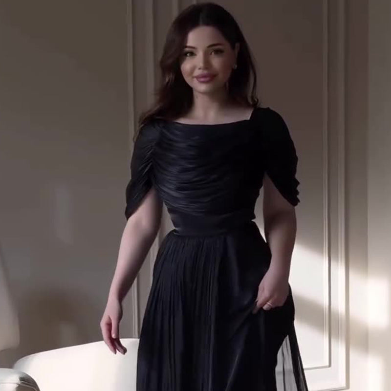 Black French Style Elegant Dress With A Square Neckline Pleated Detailing And A Fitted Waist