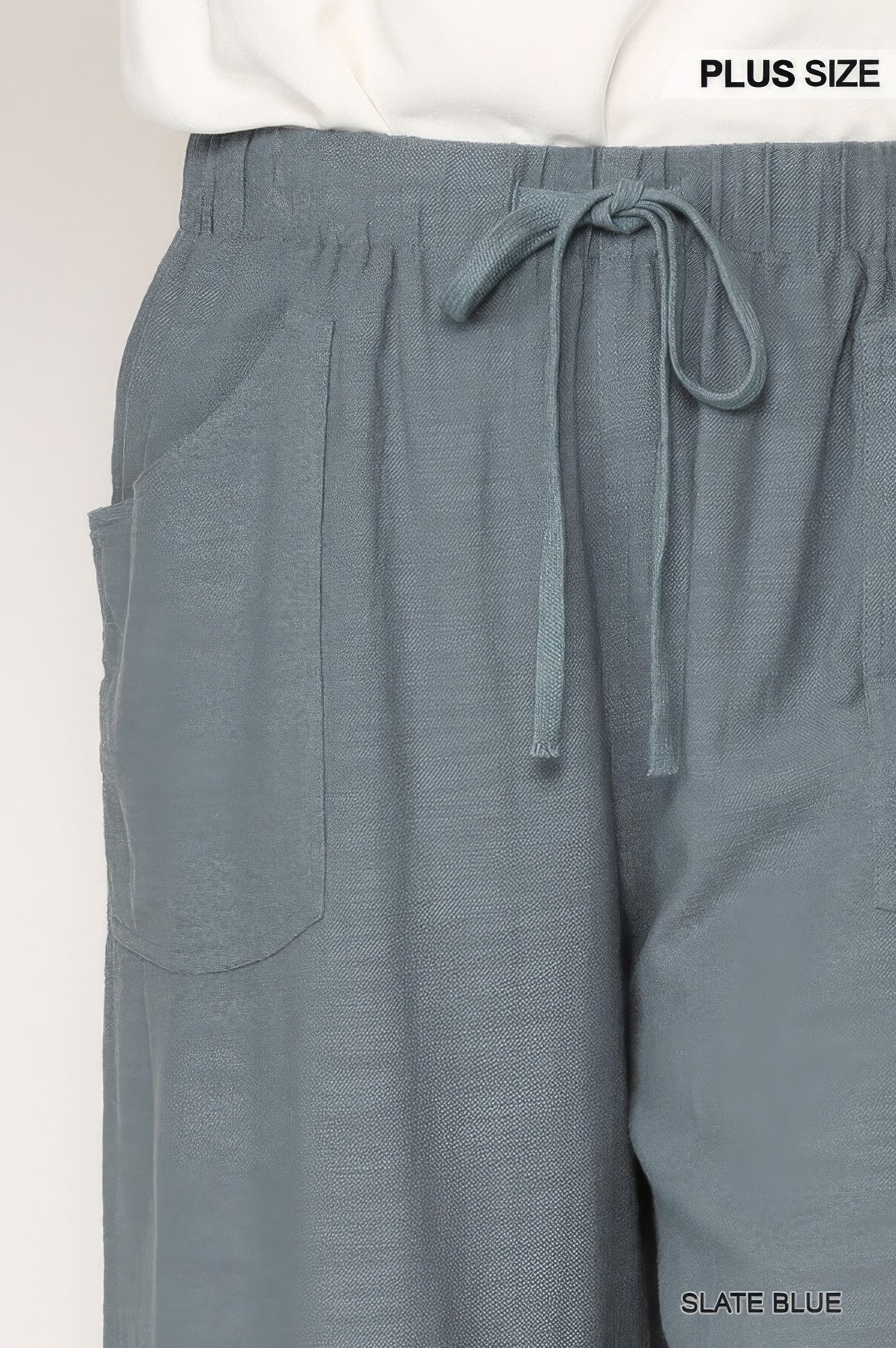 Pantaloni larghi sfilacciati con tasche