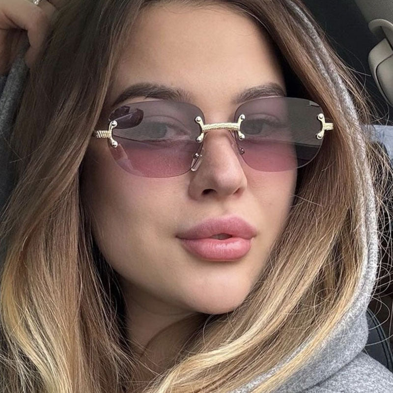 Frameless cut edge oval fashionable and high-end Instagram popular sunglasses of the same style