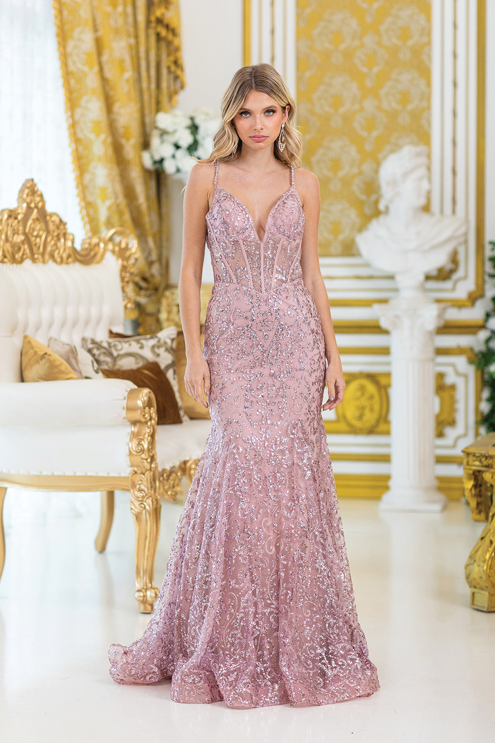 Stunning Spaghetti Strap Prom Dress with Intricate Beaded Embellishments and Sheer Panels, Featuring a Fitted Silhouette and Flared Train for a Glamorous Look