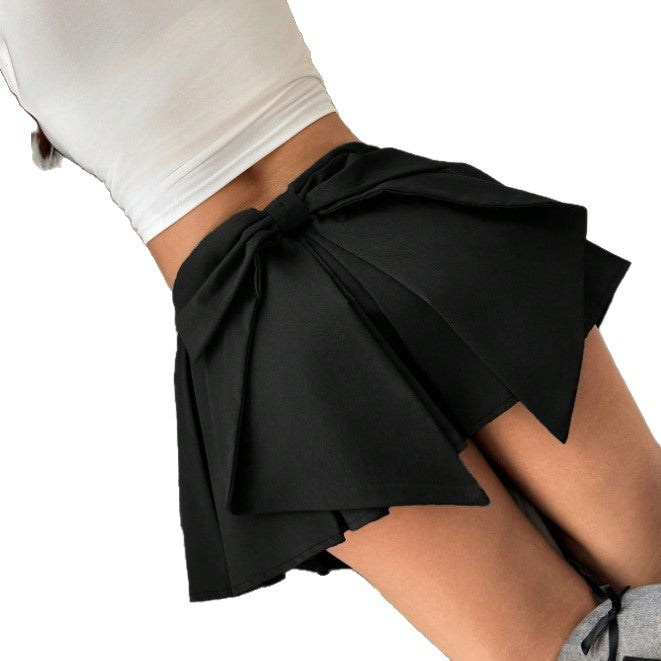 Women's Pure And Alluring Style Short Pleated Skirt With Bow Accent
