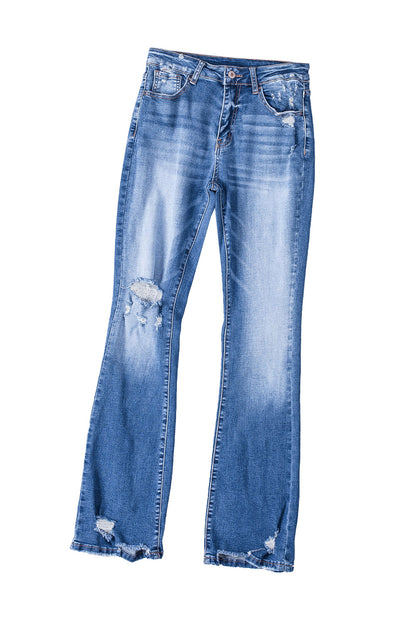 Jeans svasati a vita alta con orlo grezzo strappato blu scuro