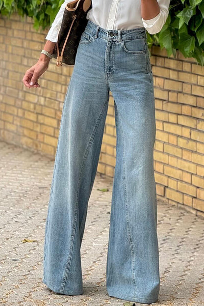 Jeans a gamba svasata con lavaggio acido blu scuro