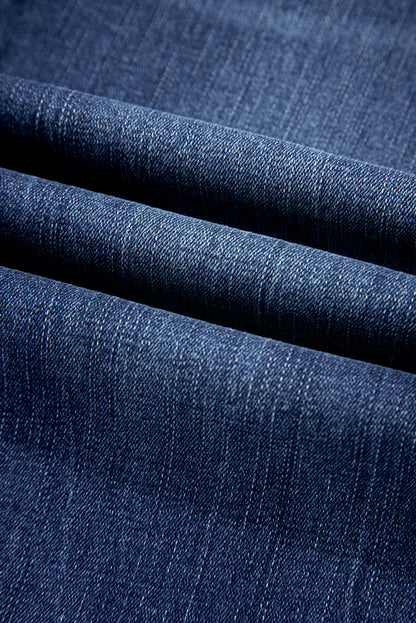 Jeans svasati a vita alta con lavaggio minerale blu vela e orlo grezzo