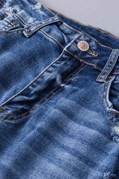 Jeans svasati a vita alta con orlo grezzo strappato blu scuro