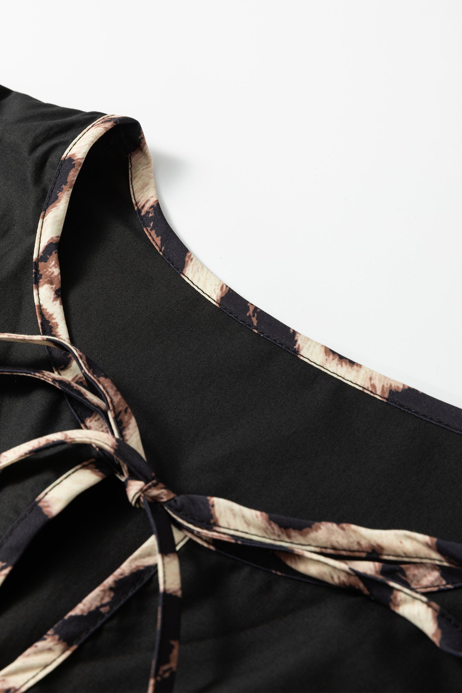 Black Plus Size Long Sleeve Leopard Contrasted Trim Tie Neck Flared Mini Dress