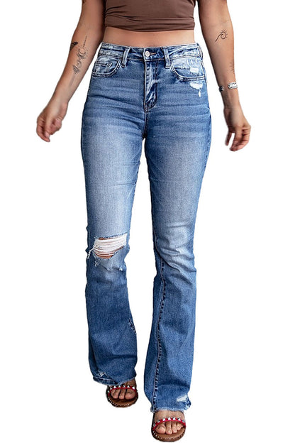 Jeans svasati a vita alta con orlo grezzo strappato blu scuro