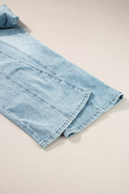 Jeans a gamba svasata con lavaggio acido blu scuro